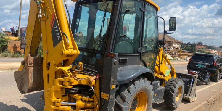 DRIP Coordinator Impounds Unauthorized Backhoe in Obuasi, Warns Against Equipment Misuse
