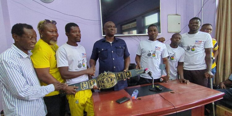 Adaptive Boxing Federation Presents Poland Title to Ghana Boxing Authority President